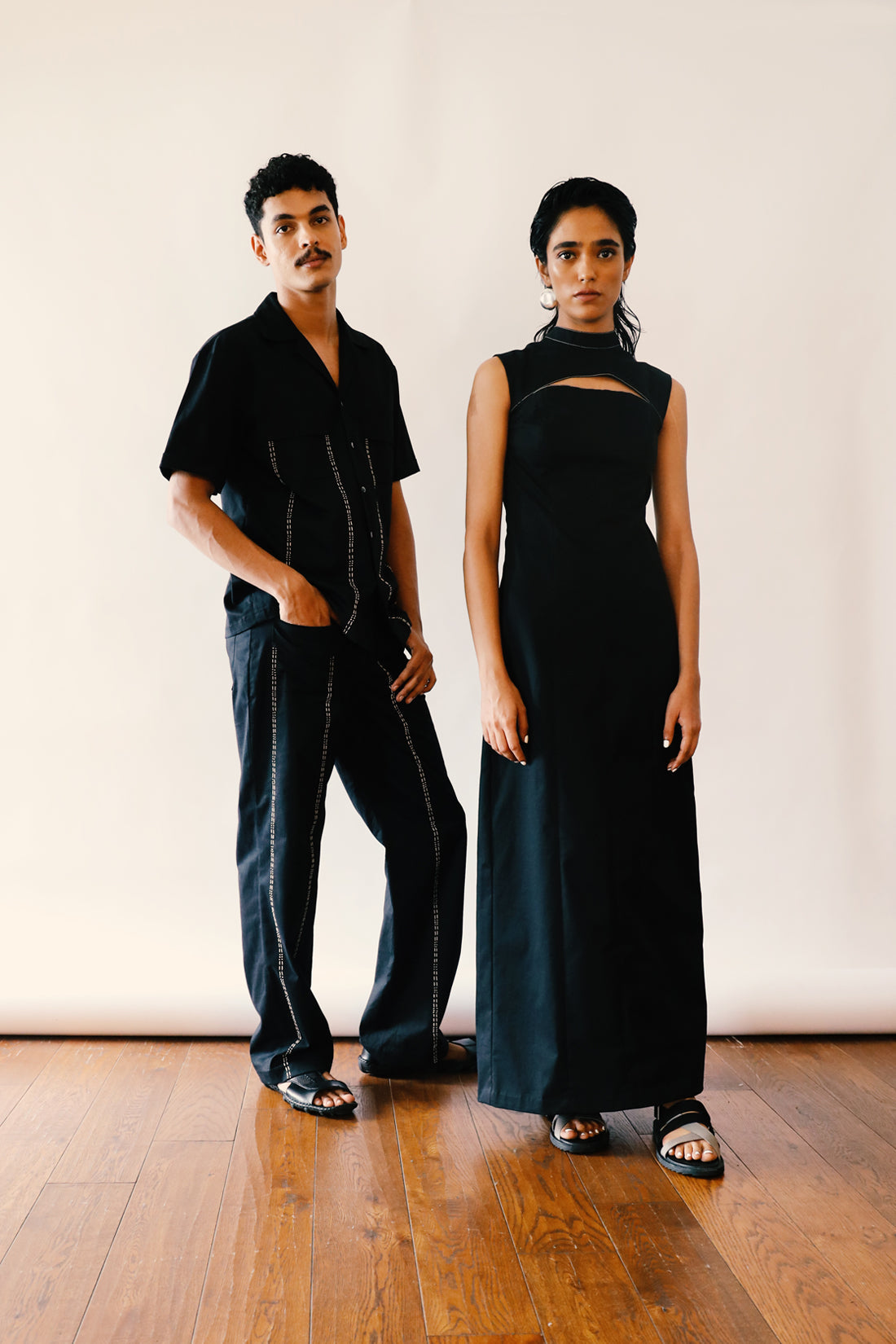 ELONGATING BLACK CUT-OUT DRESS