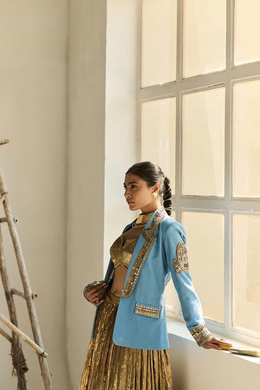 DENIM BLAZER WITH GOLD BUSTIER TOP AND SKIRT