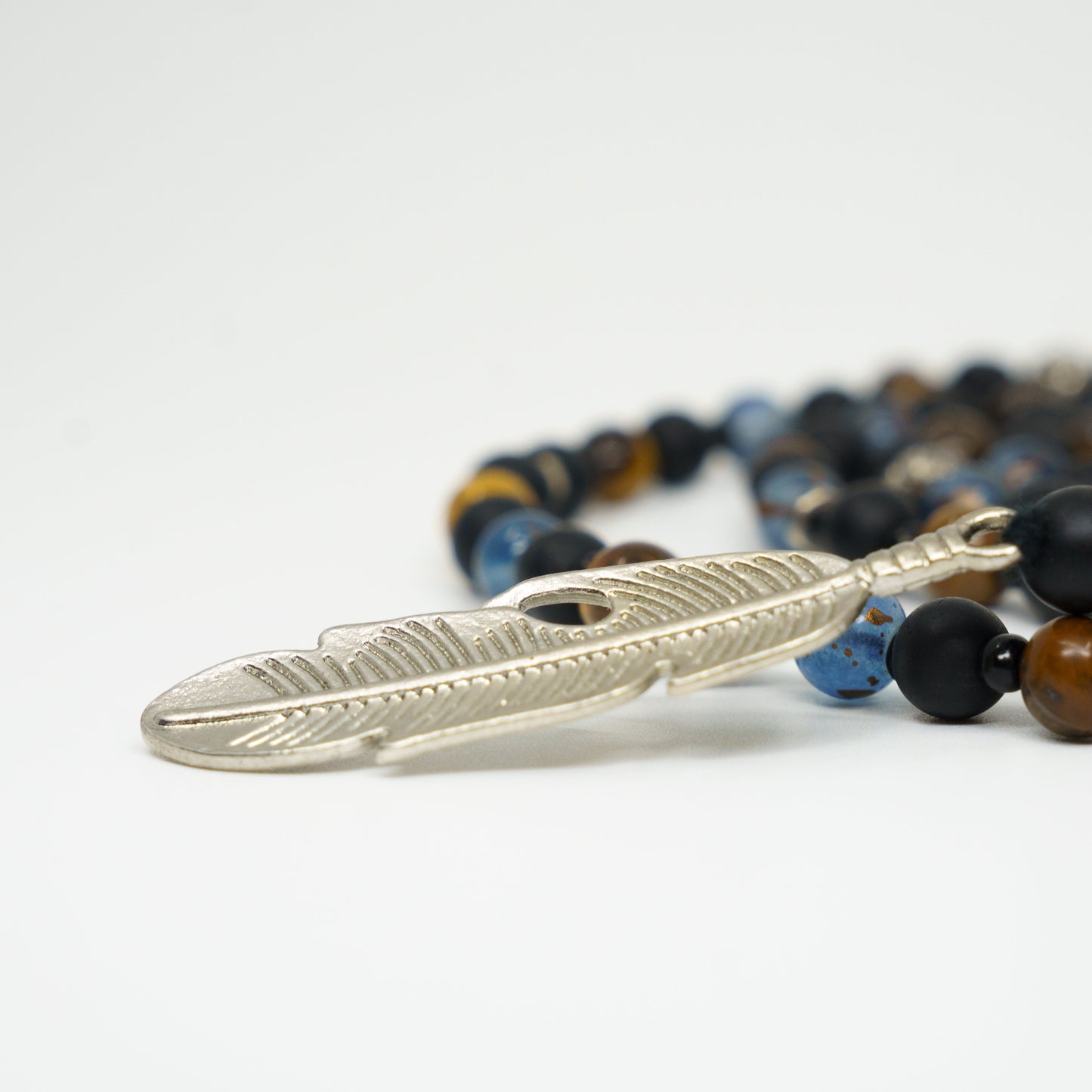 Mystical feather charm necklace