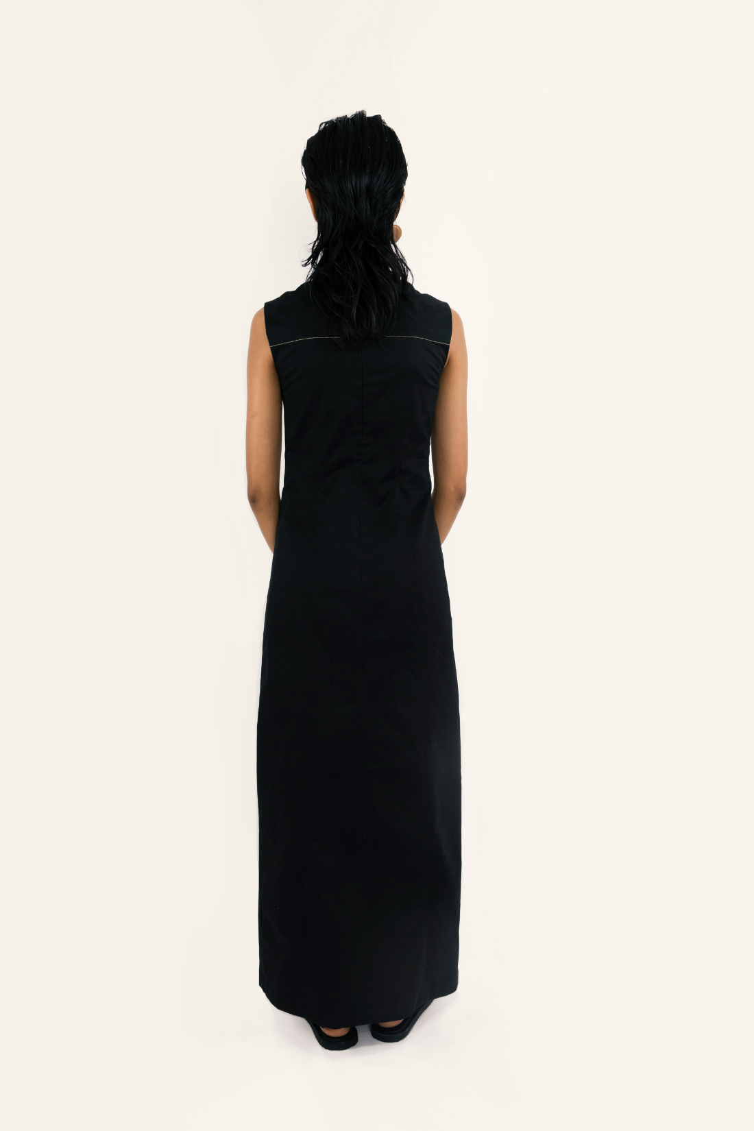 ELONGATING BLACK CUT-OUT DRESS
