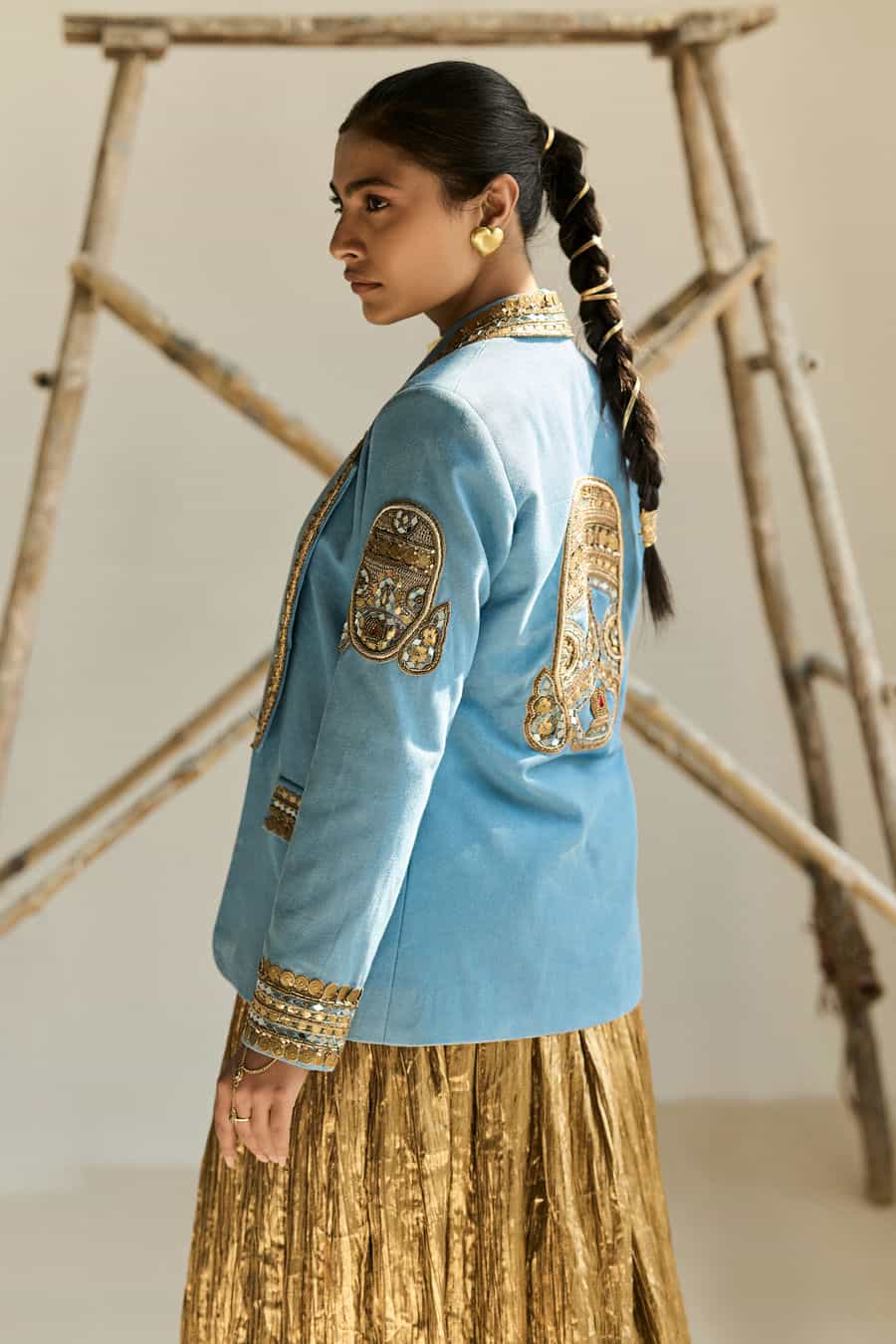 DENIM BLAZER WITH GOLD BUSTIER TOP AND SKIRT