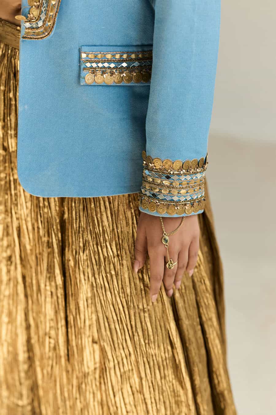 DENIM BLAZER WITH GOLD BUSTIER TOP AND SKIRT